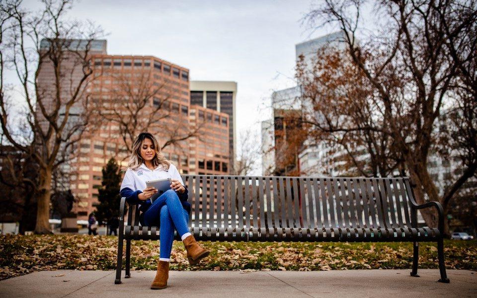 MSU Denver Online student studying remotely for a program with an international business degree concentration